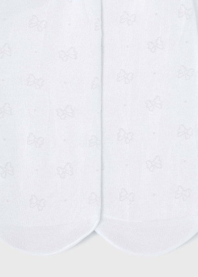 Panty media con motivo de moños para niña Sku 10460 Color Crudo
