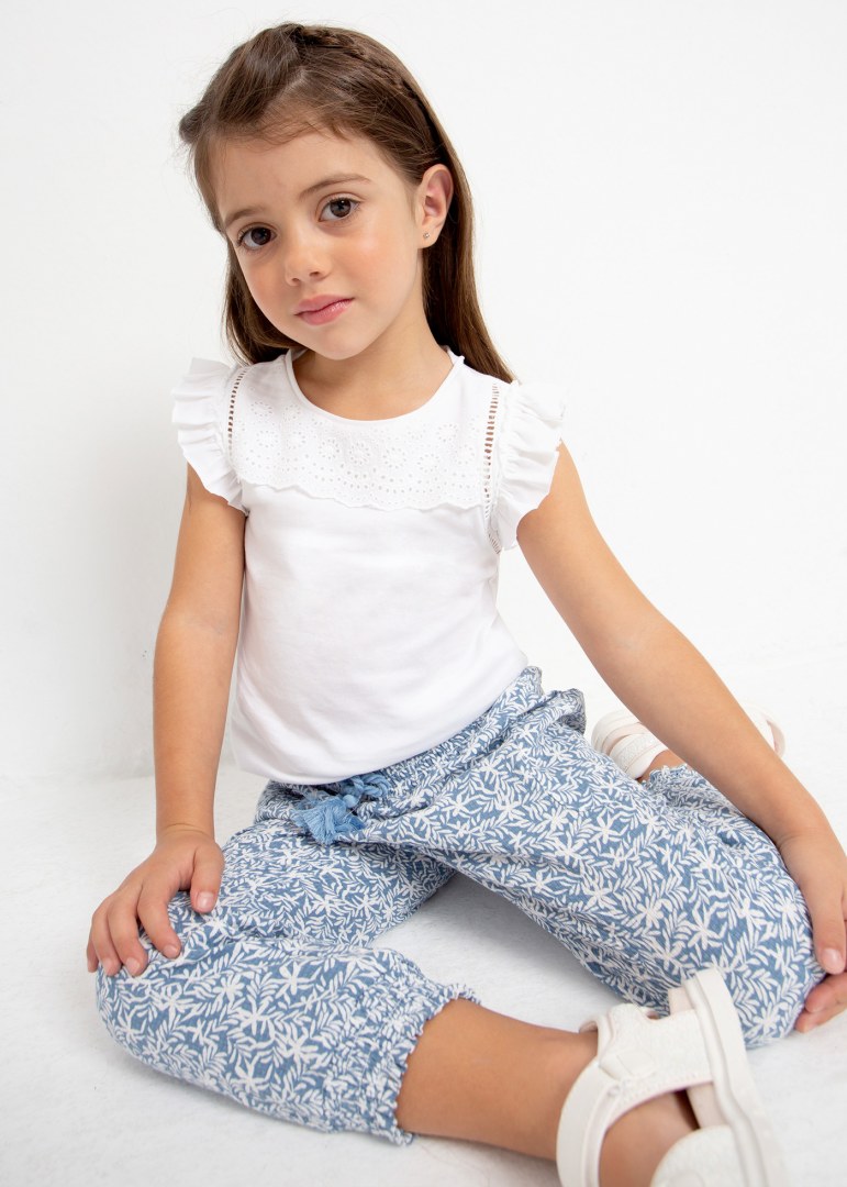 Playera sin mangas de algodón sostenible para niña Art. 23-03074-066 Blanco